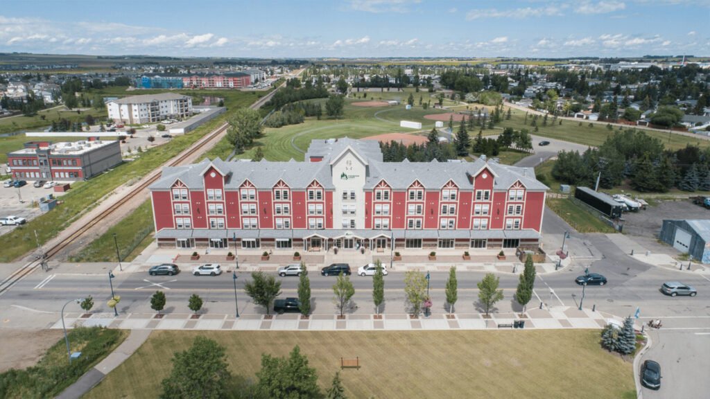 Exterior view of Cedarwood Station retirement community in Airdrie near Calgary
