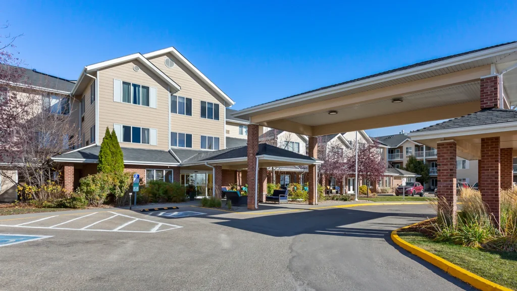 Exterior entrance of Chartwell Arbour Lake Retirement Residence in NW Calgary